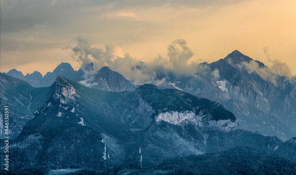 Obraz premium Sunset with a view of the Slovak and Polish Tatra Mountains