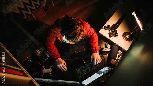 Content Creator Working Hard at his Home Office Work Desk