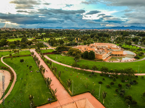 A modern building in the middle of a bogota park