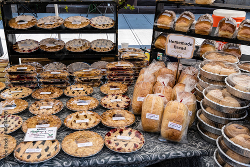 open air farmers market selling fresh homemade pies and breads