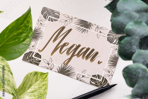 A handwritten greeting card with the name 