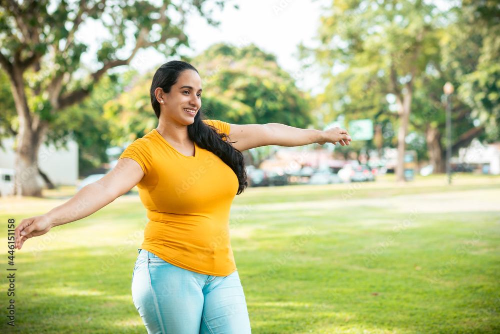 young latin woman in the park enjoying freedom young latin woman in the park enjoying freedom