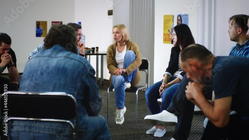 Woman speaking about traumatic event during psychotherapy session