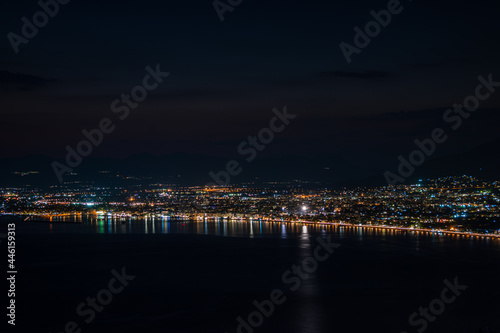 Aerial night view of Kalamata city, Greece. Kalamata is one of the most beautiful cities in Greece and a popular tourist destination