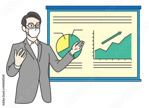 プレゼンを行うマスクを付けた男性	
