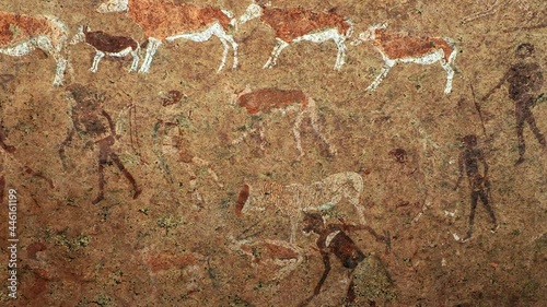 Ancient prehistoric cave painting known as the White Lady of Brandberg dating back at least 2000 years and located at the foot of Brandberg Mountain in Damaraland, Namibia, Africa. photo