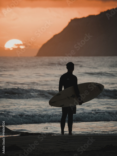 Surfer and sunrise