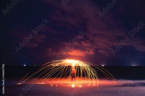 Steel wool photography at beach during the night