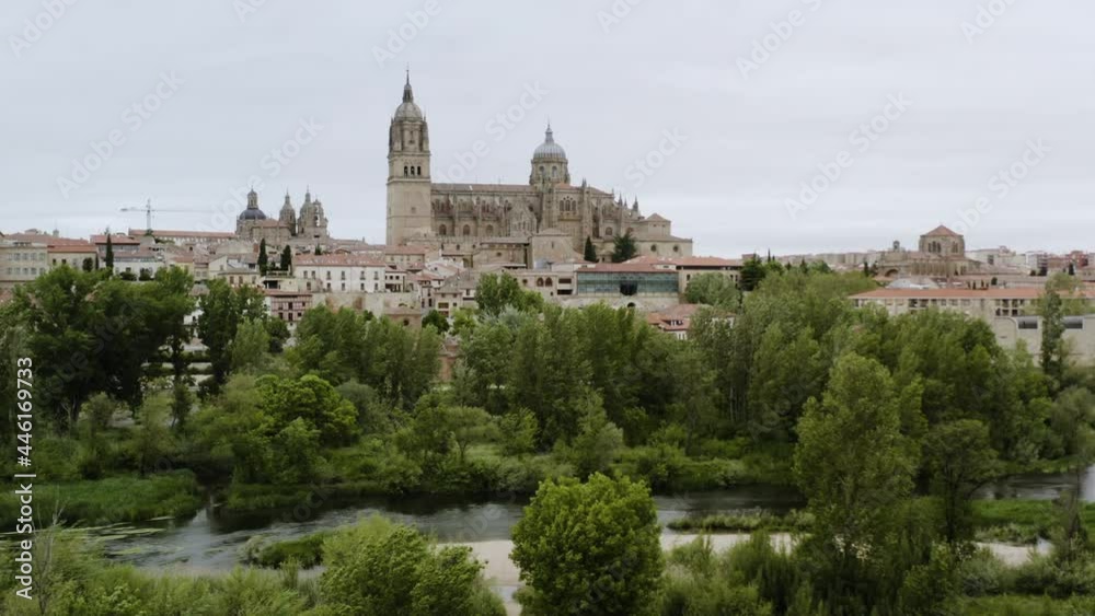 Distant View Of The Salamanca Cathedral From The Viewpoint Of Tormes River In Salamanca, Spain. aerial Distant View Of The Salamanca Cathedral From The Viewpoint Of Tormes River In Salamanca, Spain. aerial