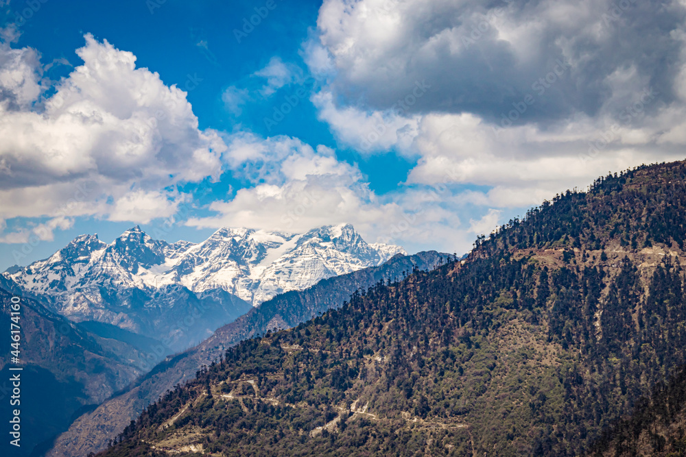 himalaya mountain valley with bright blue sky at day from hilltop