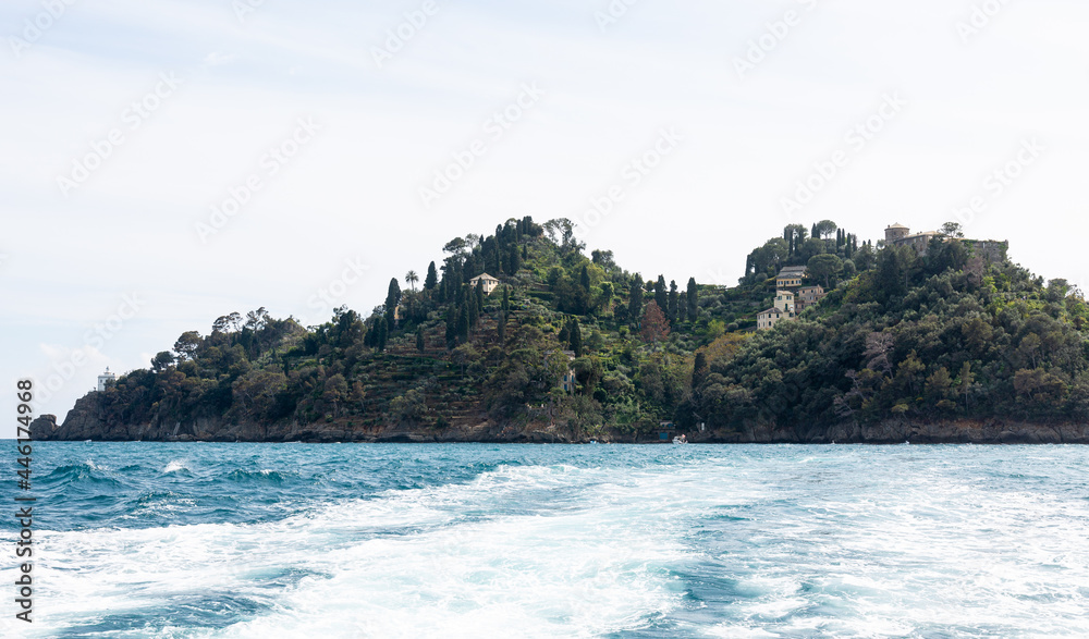 Land near Portofino from boat in the sea