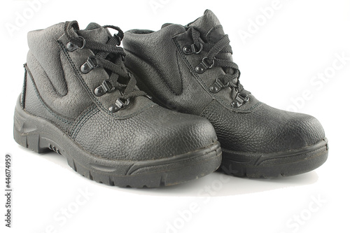 black steel toe cap work safety boots isolated on a white background
