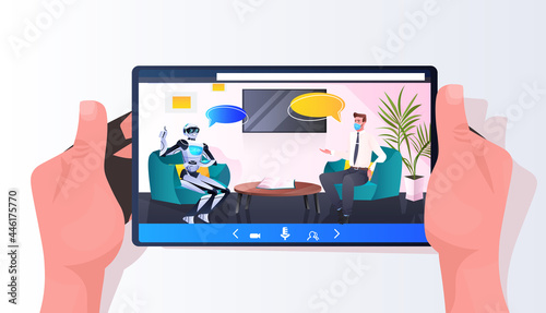businessman discussing with robot during meeting partnership chat bubble communication artificial intelligence