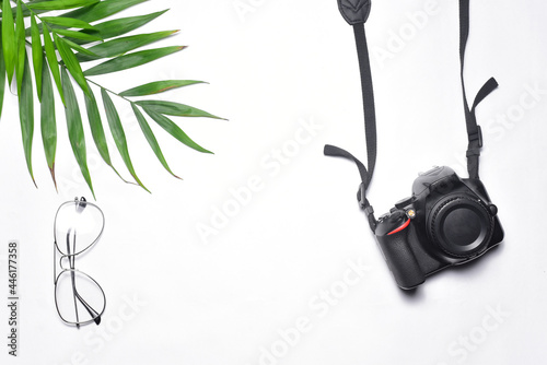 Travel concept background with black camera.