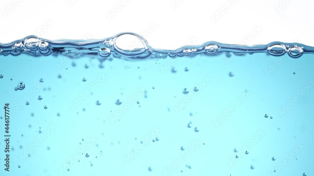 Super Slow Motion Shot of Clear Waving Water With Bubbles Background at 1000 fps. Super Slow Motion Shot of Clear Waving Water With Bubbles Background at 1000 fps.