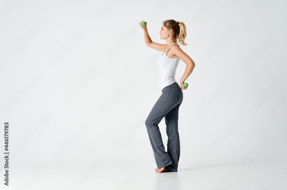 woman with dumbbells in hands exercise lifestyle fitness motivation woman with dumbbells in hands exercise lifestyle fitness motivation