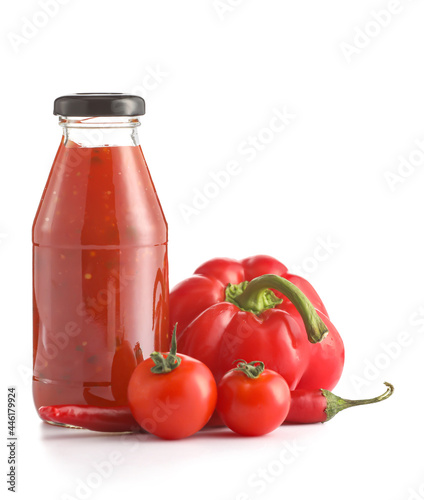 Bottle of chili sauce on white background