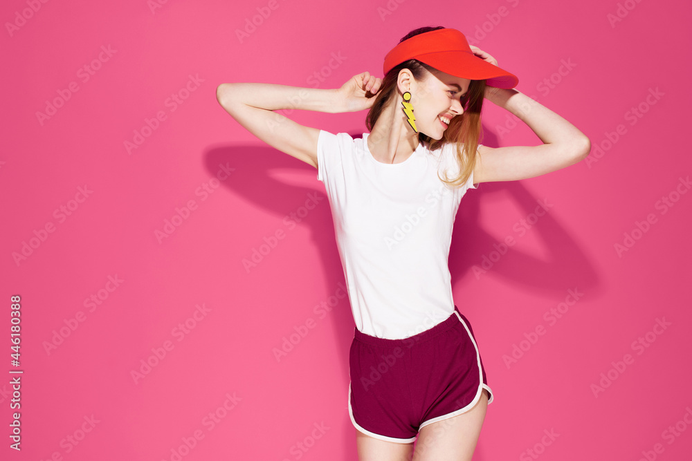 cheerful pretty woman in red cap summer clothes fashion posing pink background cheerful pretty woman in red cap summer clothes fashion posing pink background