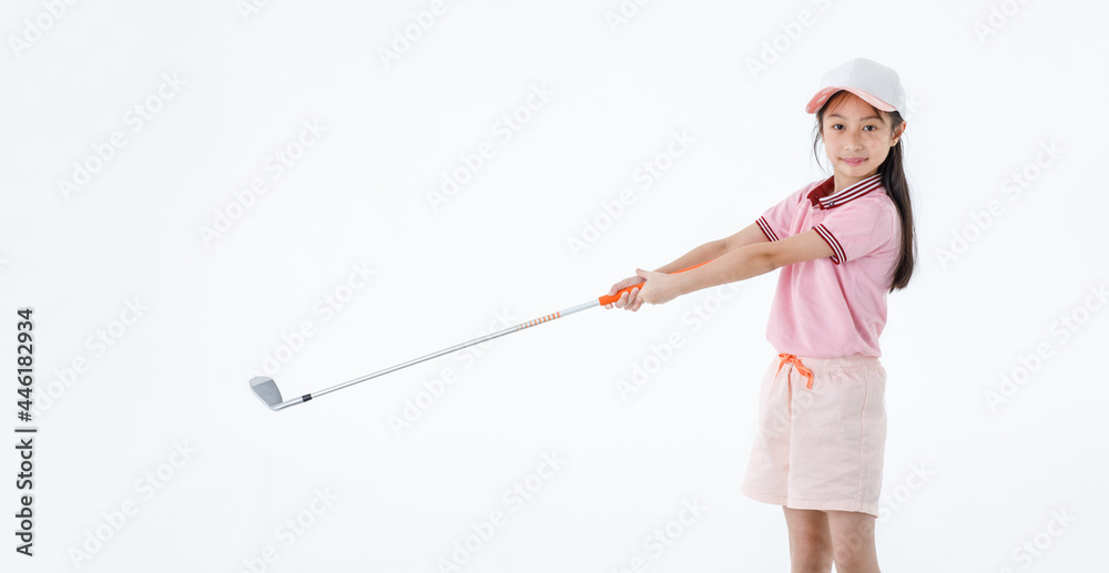 Studio shot of pretty cute long hair little Asian golfer in sport uniform and colorful cap stand posing holding golf driver on white background Studio shot of pretty cute long hair little Asian golfer in sport uniform and colorful cap stand posing holding golf driver on white background