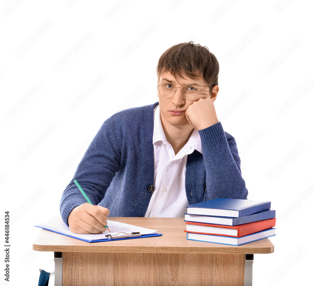Student sitting at desk on white background Student sitting at desk on white background