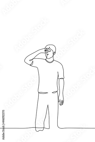 man stands covering his eyes with his hand like a visor, he is trying to see something in the distance - one line drawing. the concept of a beholder, observer, blind or poorly seeing person