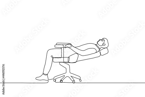 man lies in a recliner chair - one line drawing. concept of resting in the office, lying on an orthopedic chair