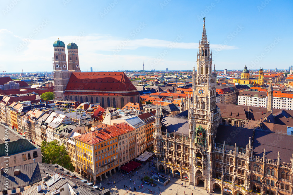 Fototapeta premium New Town Hall and Frauenkirche in Munich . Architecture of Marienplatz in Munich Bavaria Germany . Tourists visit Germany
