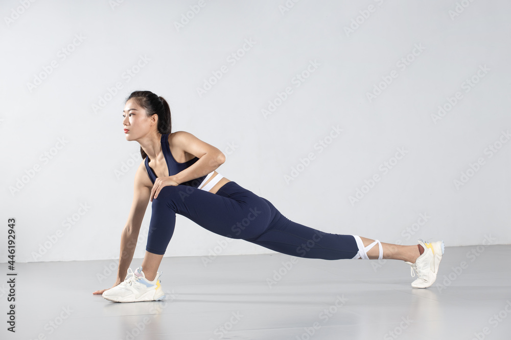 Slim girls warm up in yoga at the gym Slim girls warm up in yoga at the gym