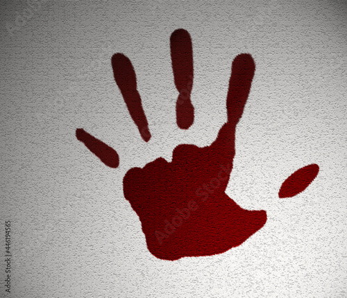 Impronta di mano insanguinata su un muro
