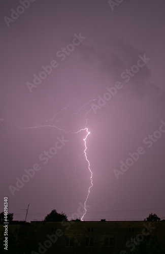 Lightning during a storm over the city in the nightLightning during a storm over the city in the night