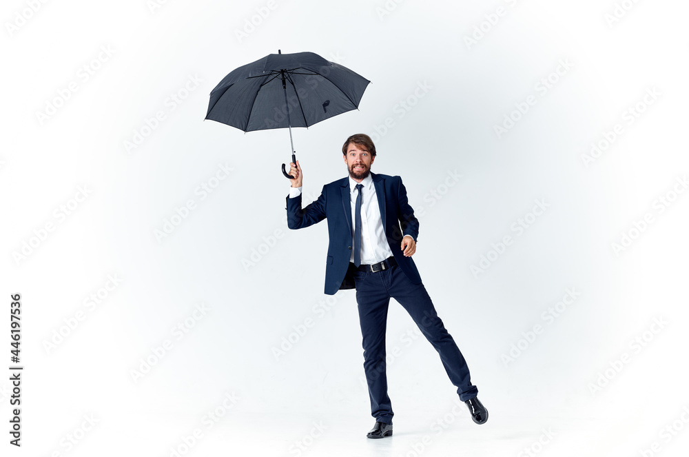 man in suit with umbrella weather protection from rain man in suit with umbrella weather protection from rain