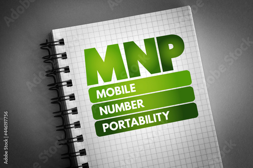 MNP - Mobile Number Portability acronym on notepad, technology concept background photo