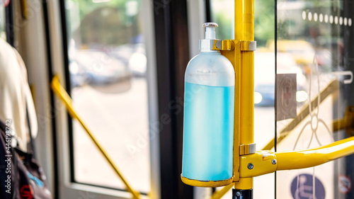 Bottle with antiseptic in a trolleybus