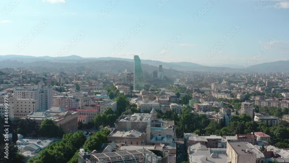 Aerial view Tbilisi city centre, Georgia. Cityscape panorama with new architecture. Drone footage 4K of urban landscape. Aerial view Tbilisi city centre, Georgia. Cityscape panorama with new architecture. Drone footage 4K of urban landscape.