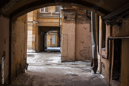 Arch inside courtyard of typical St Petersburg vintage apartment house