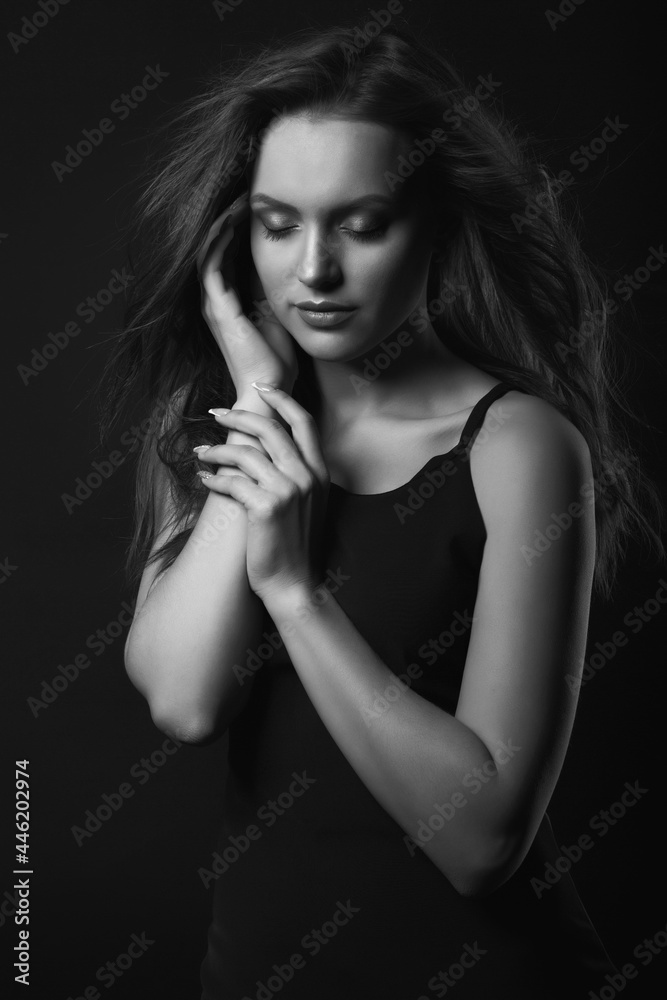 Stylish studio portrait of a sensual young woman with perfect makeup Stylish studio portrait of a sensual young woman with perfect makeup