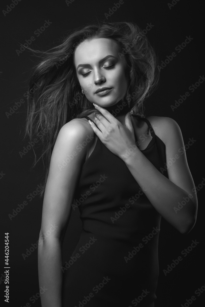 Stylish studio portrait of a sensual brunette woman with perfect makeup Stylish studio portrait of a sensual brunette woman with perfect makeup