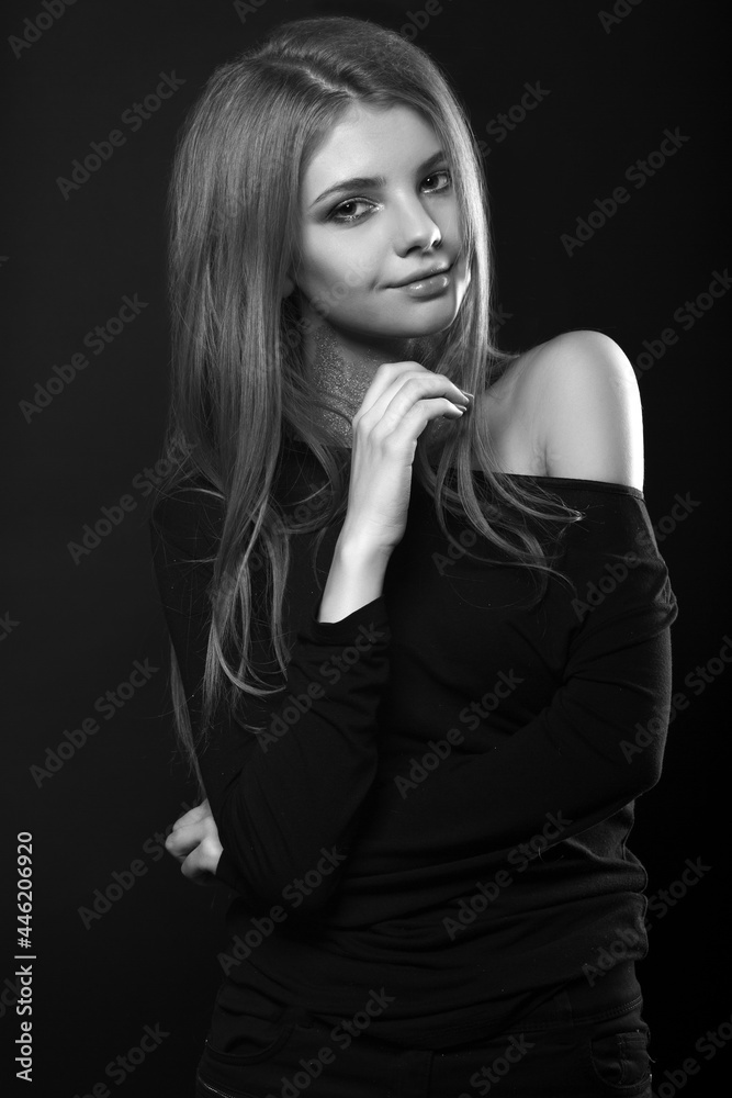 Black and white portrait of a nice woman with bare shoulders Black and white portrait of a nice woman with bare shoulders