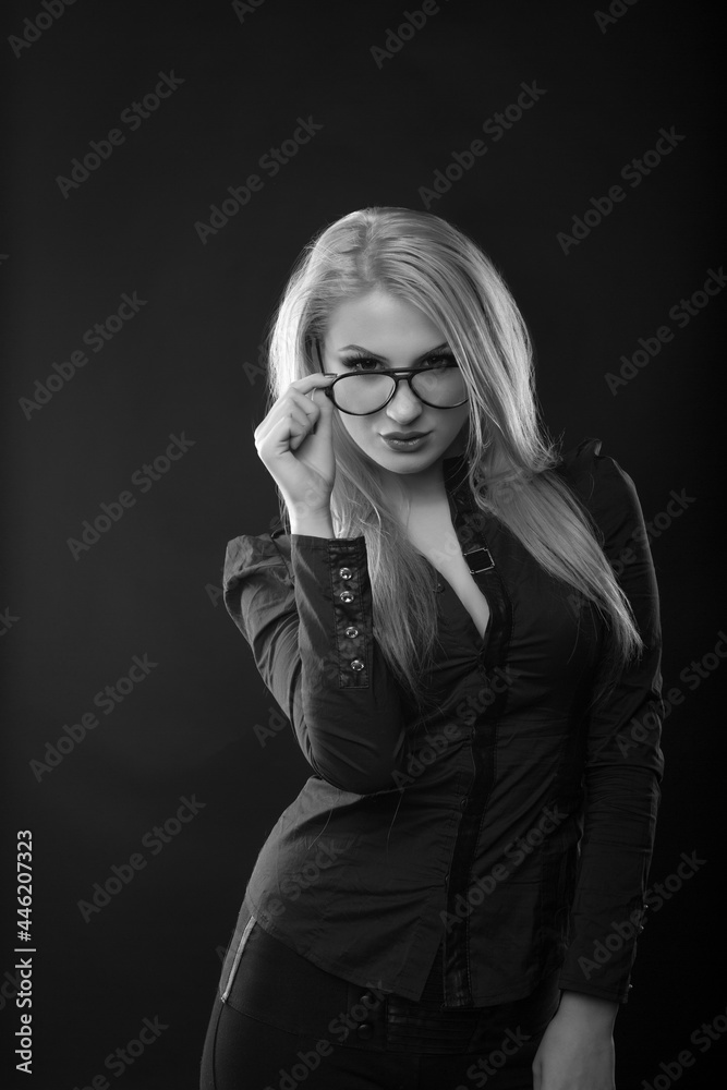 Sexy young lady with straight hair in eyewear and blouse Sexy young lady with straight hair in eyewear and blouse