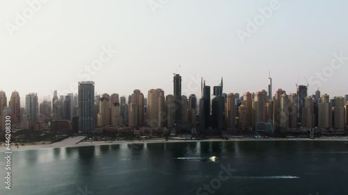 Wallpaper Mural Vertical panning from a quadcopter. Aerial shot of beach and skyscrapers, Dubai. Torontodigital.ca