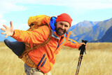 trekking mountains man walking sticks travel adventure man with backpack