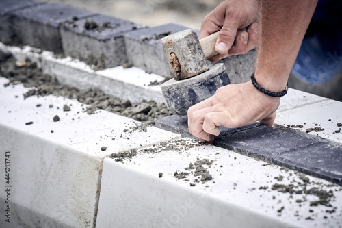 Construction worker on a public road reconstruction. © astrosystem