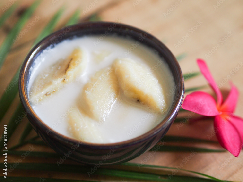 Closeup banana in coconut milk, Thai dessert sweet background. Closeup banana in coconut milk, Thai dessert sweet background.