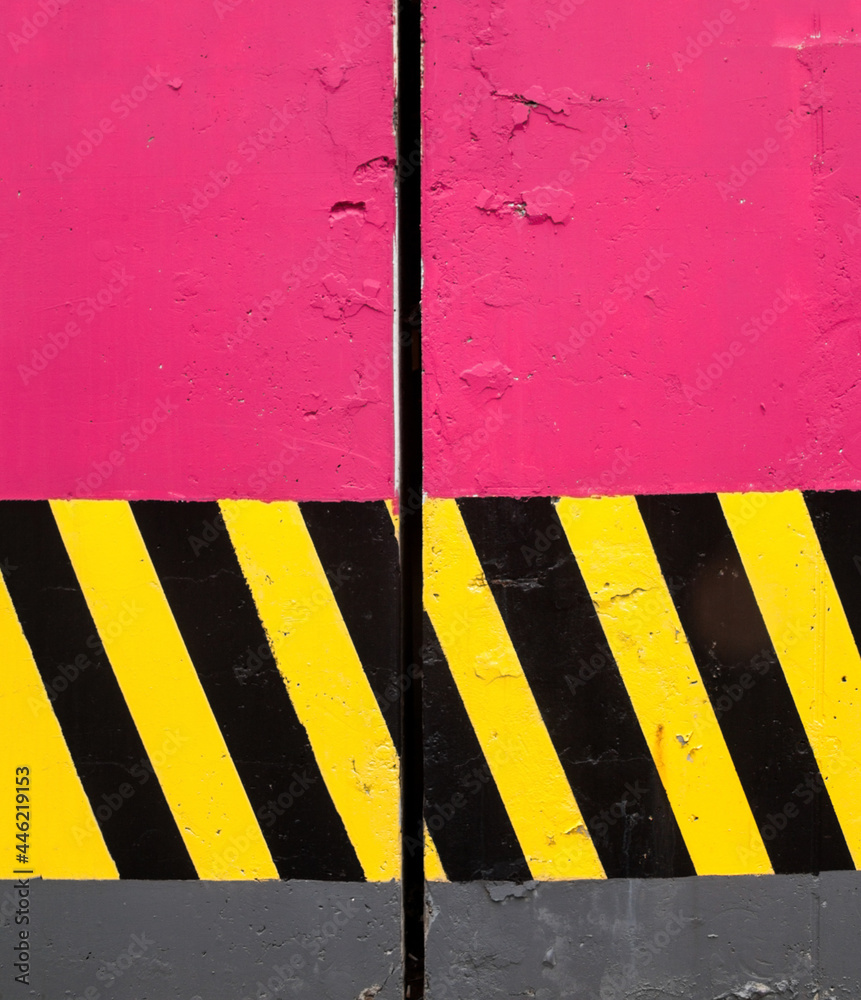 Fototapeta premium Concrete columns with safety stripes.