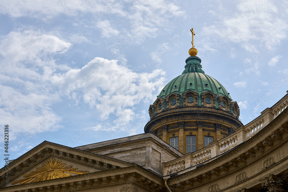 The dome of Kazan Cathedral with a cloudy sky in the background.