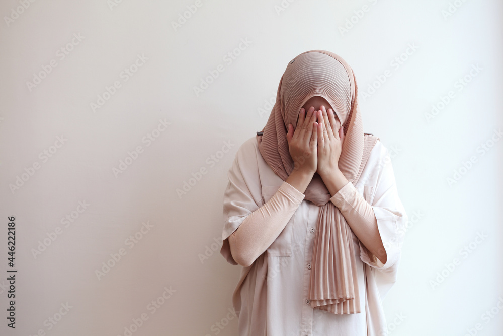 Muslim praying for god during work from home.