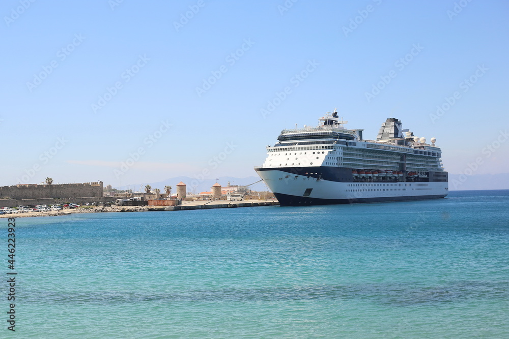 large tourist cruise liner moored seaport sunny