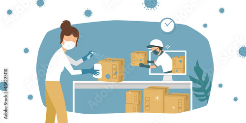 customer receives parcel delivery via internet during situation of coronavirus which people should keep social distancing, sanitizing delivered packages is important, new normal, healthcare concept