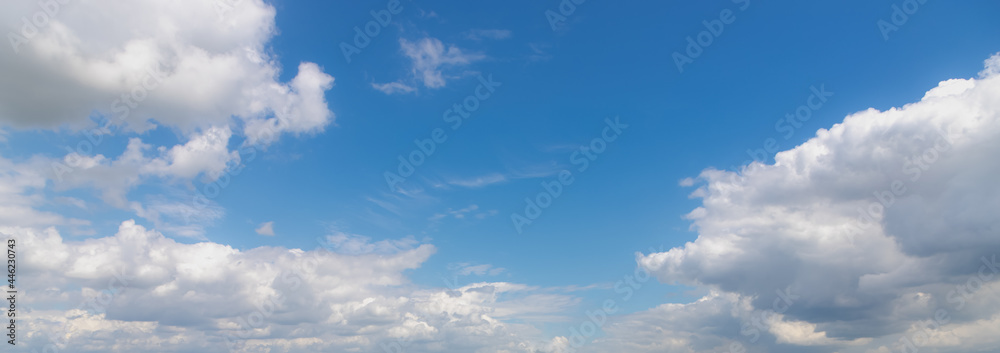 Beautiful panorama view of white fluffy cloud floating in blue sky in sunny day, Cumulus are clouds which have flat bases and are often described as puffy, Horizon nature background. Beautiful panorama view of white fluffy cloud floating in blue sky in sunny day, Cumulus are clouds which have flat bases and are often described as puffy, Horizon nature background.