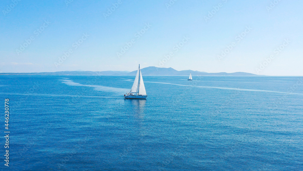 Aerial view of sailing luxury yacht at opened sea at sunny day in Croatia